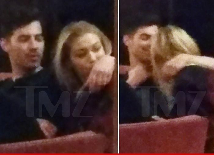 May/June 2015: Paparazzi caught Joe and Gigi Hadid hugging and kissing.