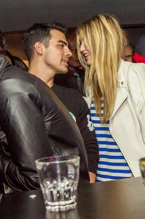 May/June 2015: Paparazzi caught Joe and Gigi Hadid hugging and kissing.
