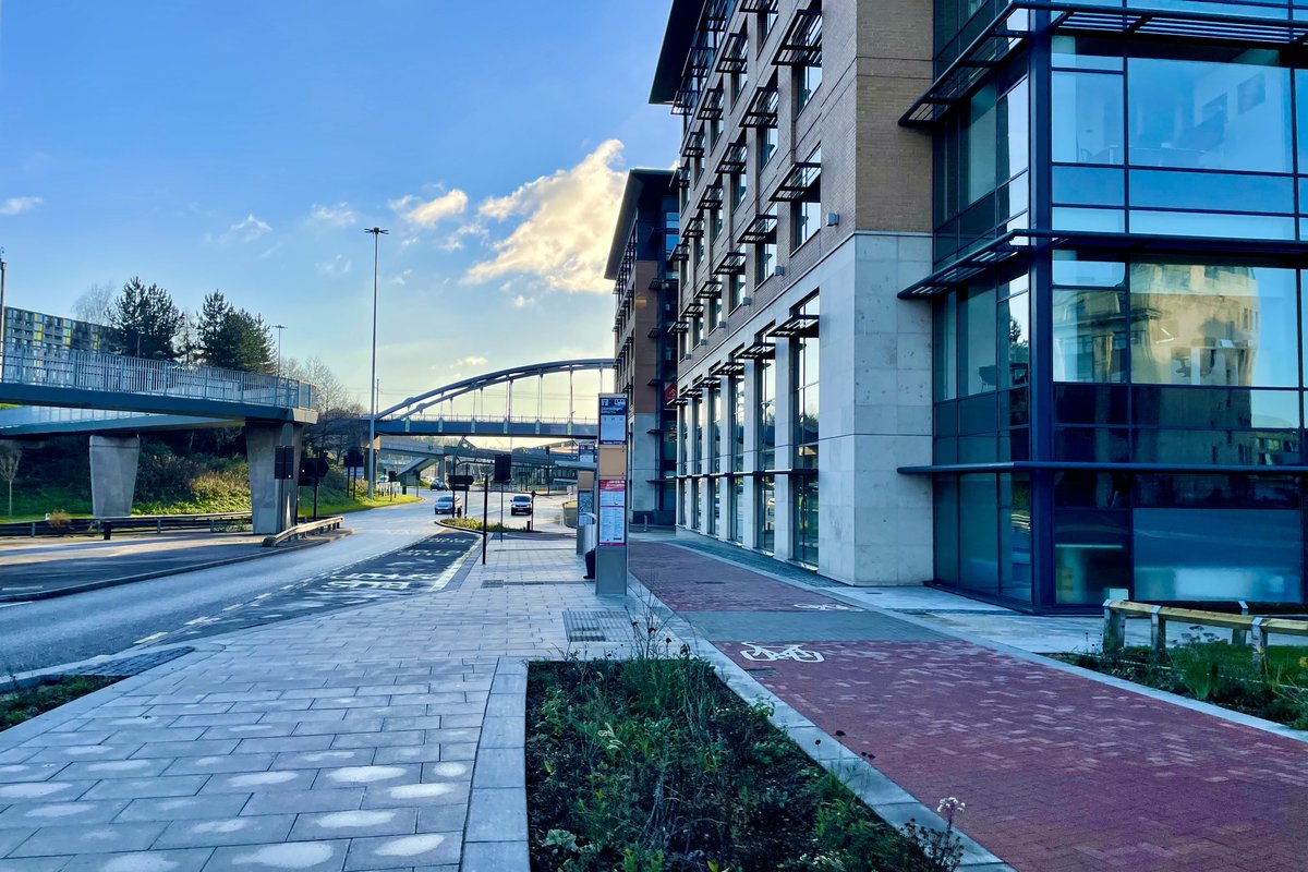 Bus stop bypass just off a busy A road in Sheffield. Lots of space to wait for the bus. No conflict when a bus pulls in, as bikes continue around the back.All this is possible to do well when first reducing the # of motor traffic lanes.