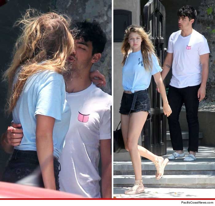 Joe and Gigi dancing, hugging and kissing each other.