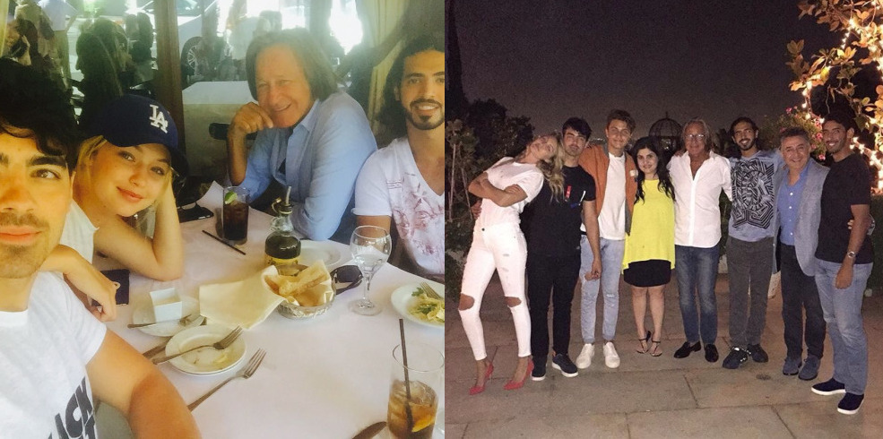 Joe and Gigi dancing, hugging and kissing each other.