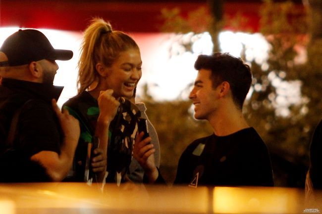 Joe went to Milan to support his ex girlfriend Gigi Hadid during the Milan Fashion Week.