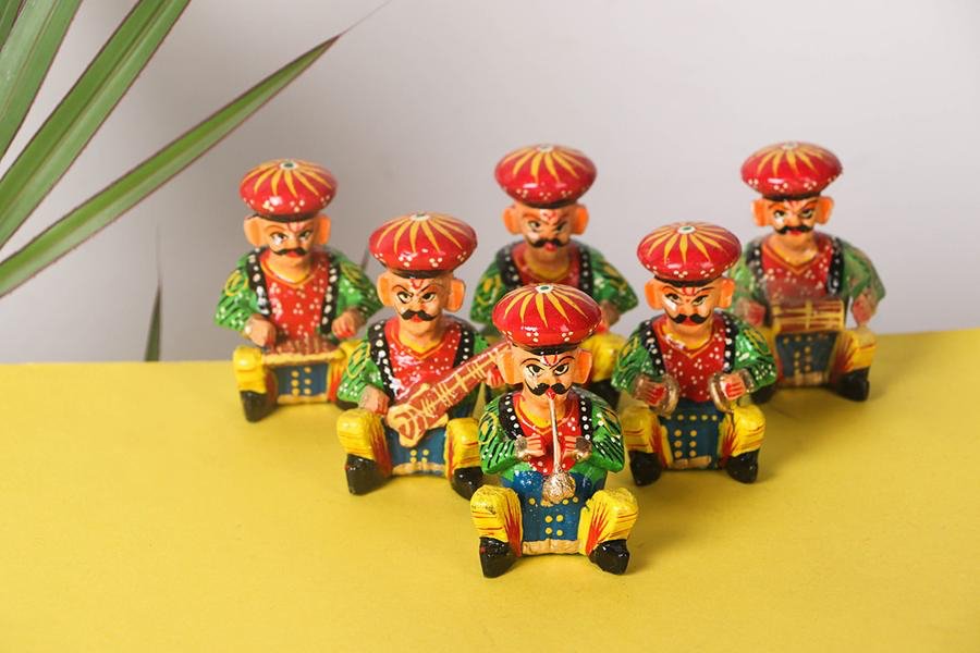 8)Wooden toys of VaranasiCraftsmen use wood of shisham, eucalyptus trees to carve out the toys according to required shape &size,hv no joints in them &are made frm natural vein of wood. Tools like lathe, chisel& hammers used to carve, surface is smoothened, coloured laqured.