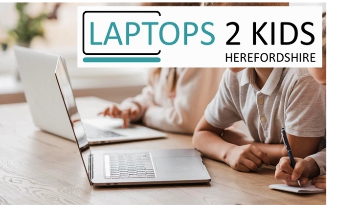 Children looking at laptop