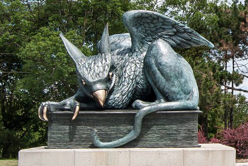 Since the Gryphon is making an appearance in my next session, I was looking for a nice picture of a Gryphon Statue, and Google images happened to show me these two images next to one another.
