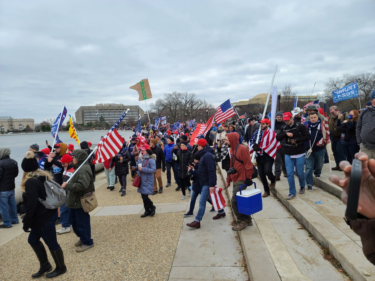 As we make our way left off 3rd and penn, we are nearing the base of the capitol. Lots of flags and poles, people talking about dragging folks out, how they are the real winners and other violent talk. As I get close to steps I see the barricade has been moved. 58/
