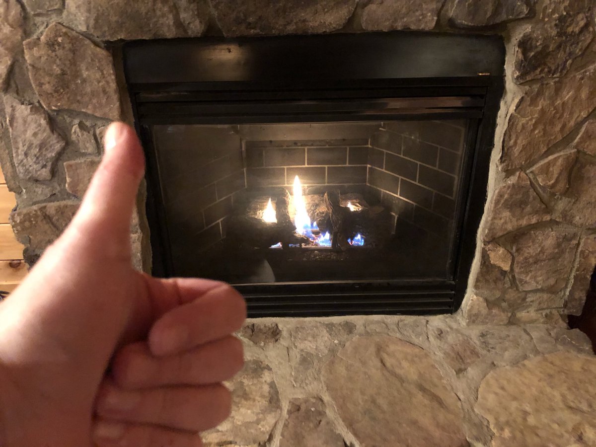 We enjoyed a fine bottle of wine in front of the fire. ($10 bottle because we’re splurging on vacation, obviously.) Relaxed, we decided to try out the hot tub in back. 5/