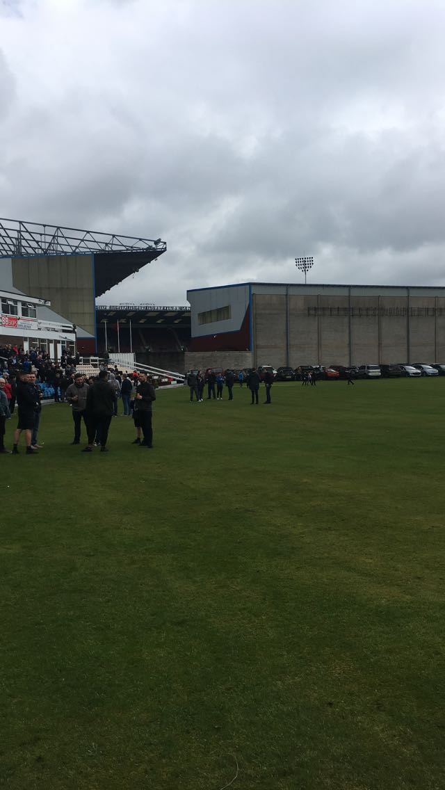 Turf Moor. Burnley gets a unfair reputation - you can get a pint for 2 quid in the cricket club next door, heckle the opening batsman if your game is during the cricket season and the teams come out to Wake Up by Arcade Fire. Glorious place