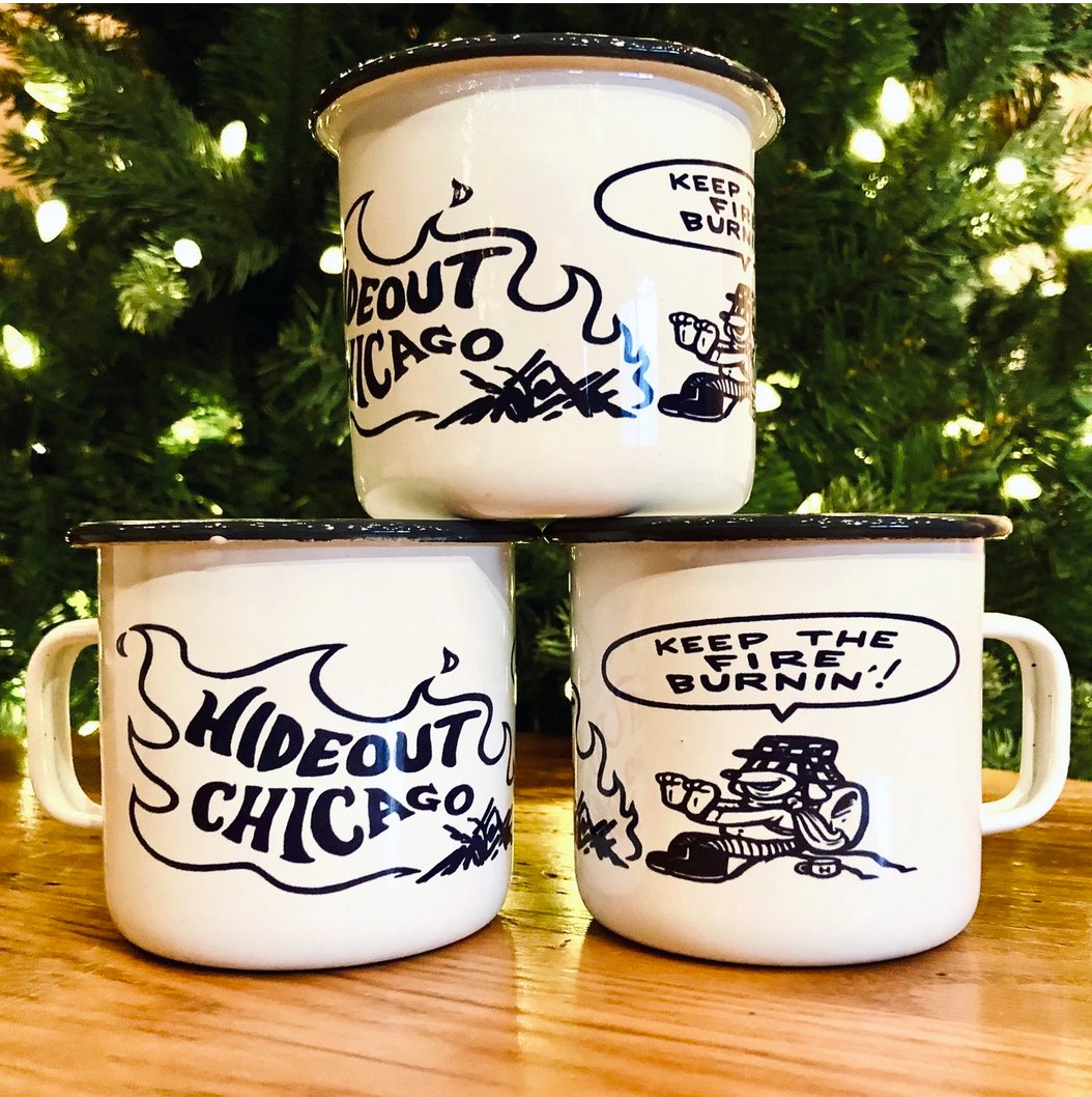 hideoutchicago's tweet photo. BACK IN STOCK ☕ We're still spending time outside, but now that it's cold it's time to huddle around the campfire, sipping a warm beverage from your Hideout enamel camp mug.

This 12 oz enamel steel mug features art by Steve Krakow!

👉 https://t.co/WkpgurZFHR https://t.co/avMbjXjGS0