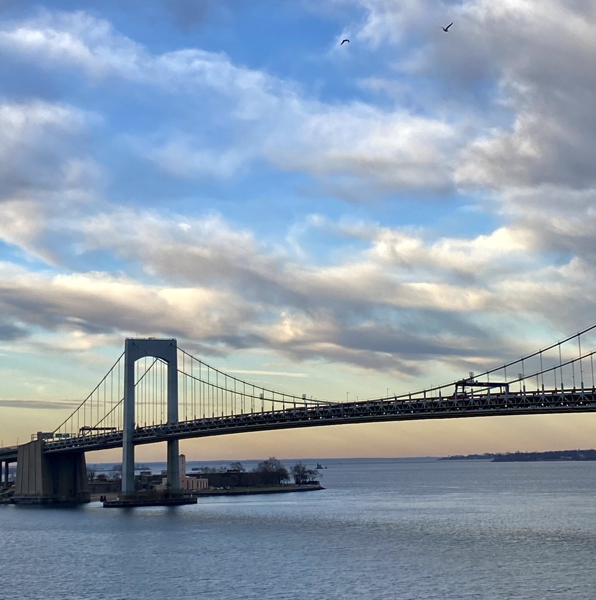 johnswan's tweet photo. Late after view of the Throgs Neck Bridge in Queens, New York. The bridge is beautiful but clouds are what initially caught my attention. 
Have a really nice day!
#NYC #brides #bluesky #clouds https://t.co/kwWMBEicGL