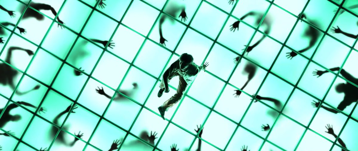 and this could mean how this persona that is on stage is hiding a part of them away, and this returns when shadowy hands are seen from under the stage threatening to come to the surface.