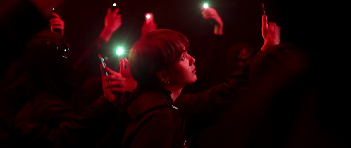 (also i’d like to note how the flashes of light from the cameras are tinted with green as if no matter what yoongi does, those cameras will only capture his persona.)