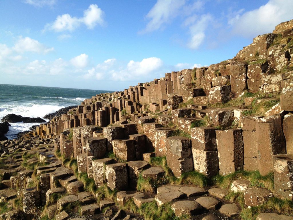 The next day we caught a train up to Coleraine and then a bus to the Giant's Causeway. The Causeway was a magical place, unlike anywhere we had ever been before and we loved exploring the basalt columns and windy cliff tops.