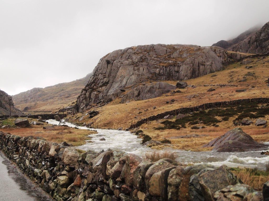 Calvin got his first taste of Snowdonia and it was love at first sight (his jeans didn't love the mud at the bottom of that big rock quite so much).