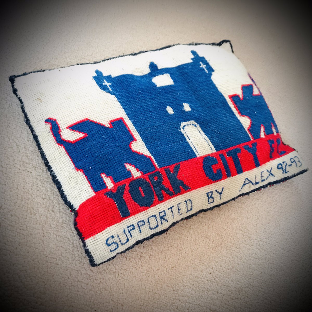 A cushion hand-sewn by my own mum. Aren’t mums ace? We used to hang the scarf out of the car window on the way to Away games (is that still a thing?) until the day we drove past a field of manure and it stank for weeks.....