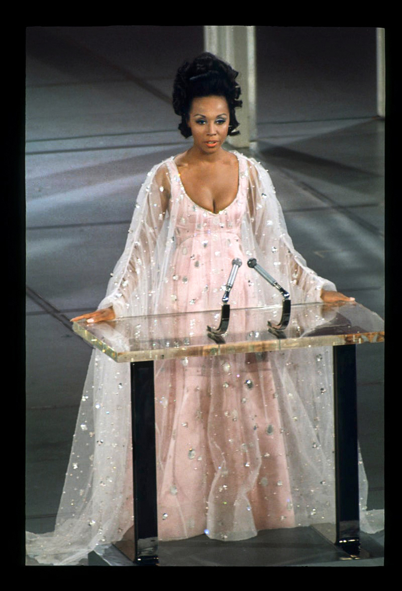  CANCER - Diahann Carroll in William Travilla, Academy Awards/Oscars (1969)- Anjelica Huston in Tzetzi Ganev, Academy Awards/Oscars (1986)- Princess Diana in Christina Stambolian, Serpentine Gallery Gala (1994)- Lil' Kim in Misa Hylton, MTV VMAs(1999)