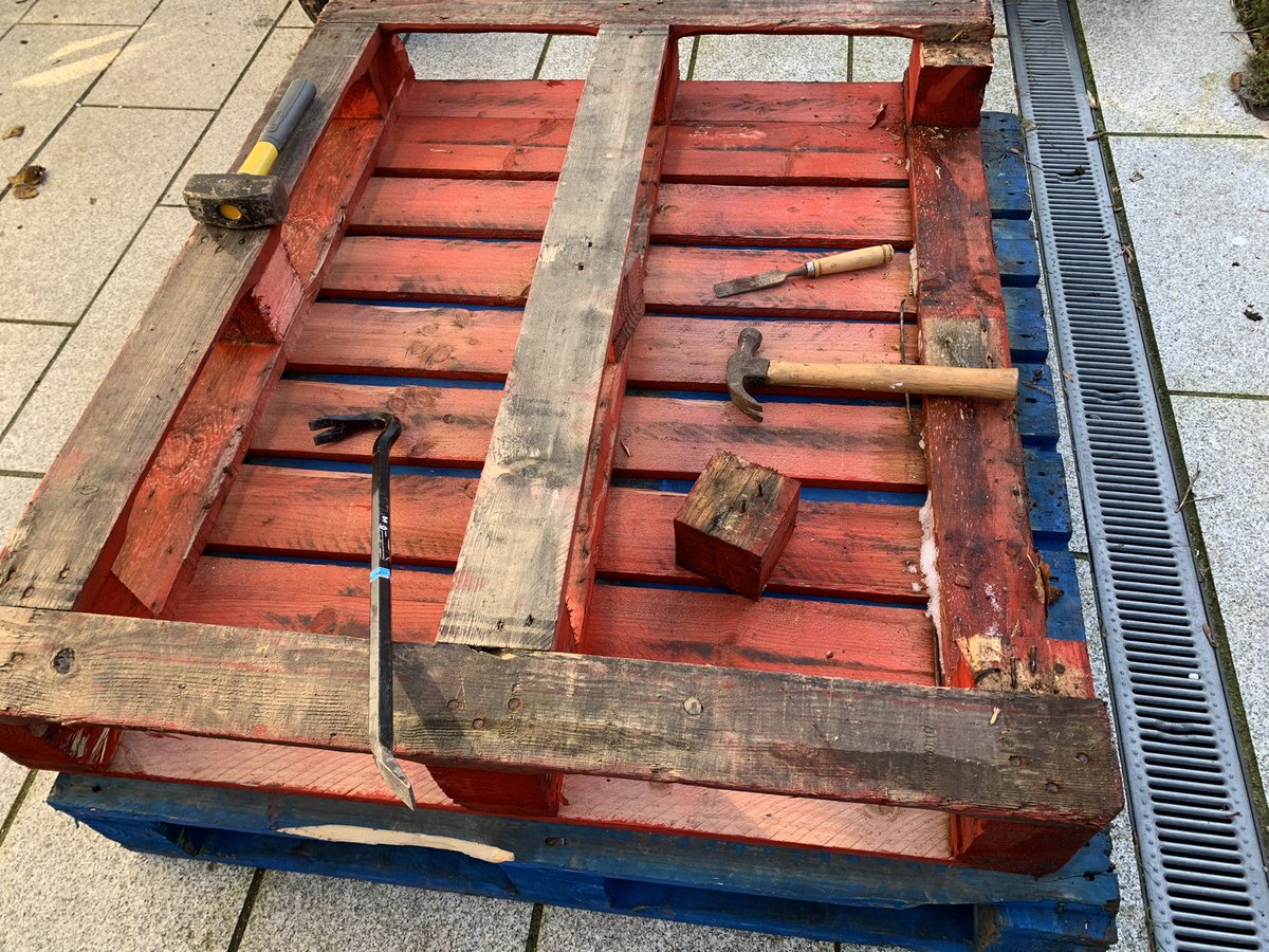 The plan is to take the back off first. We learned the hard way there are many hard ways to break down a pallet and at least one easy way! ...