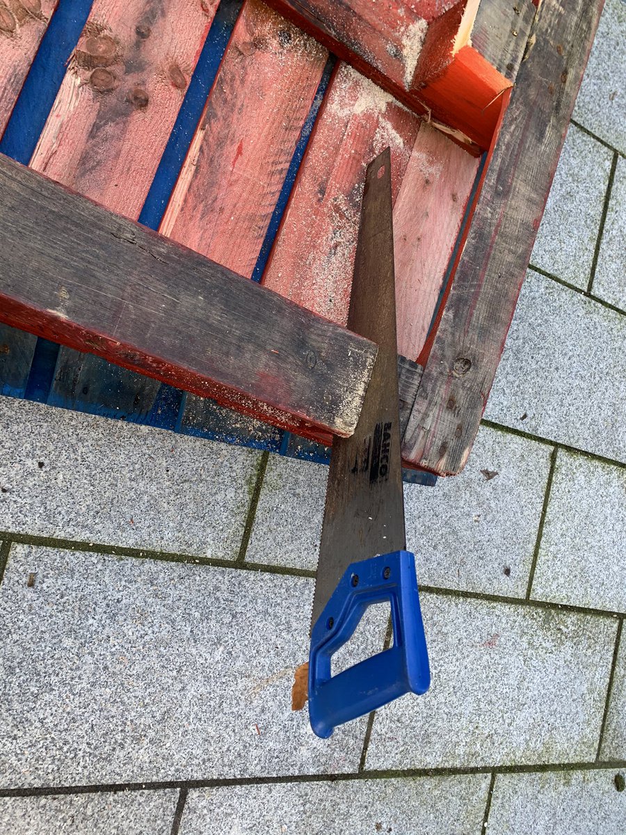 We found that sawing the back board near the block at each end like this allowed us to use the board as a lever and the board and the middle block came off.