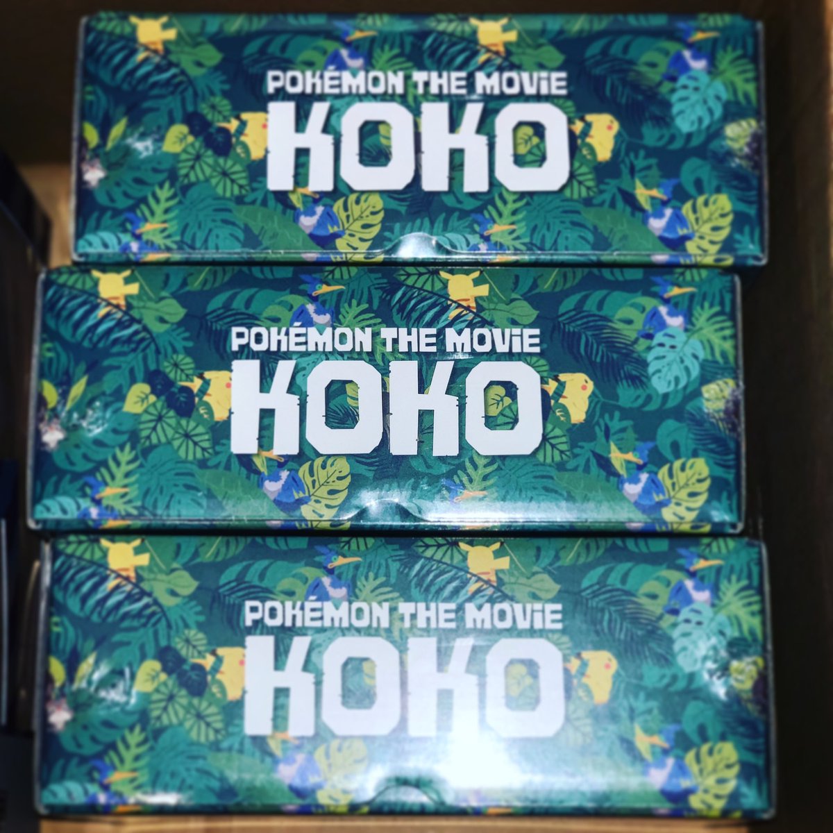 OtakuGuru_com's tweet photo. My three fav. boxes - Pokemon KoKo movie special boxes with Pikachu card, Celebi coin, booster packs! Will be opening one of them but not sure when ;) #PokemonKoko #PokemonCoco #Pokemon https://t.co/EtuO8kc3C6