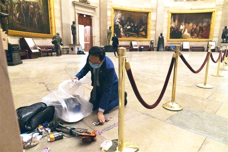 HEARTWARMING—it was past 12am & for 90 min, he crouched down & filled half dozen trash bags. When he finished cleaning up the Capitol rotunda, he cleaned adjacent rooms. Then worked until 3am to certify the election—he had been awake for >36 hours. Who is he? Rep  @AndyKimNJ 