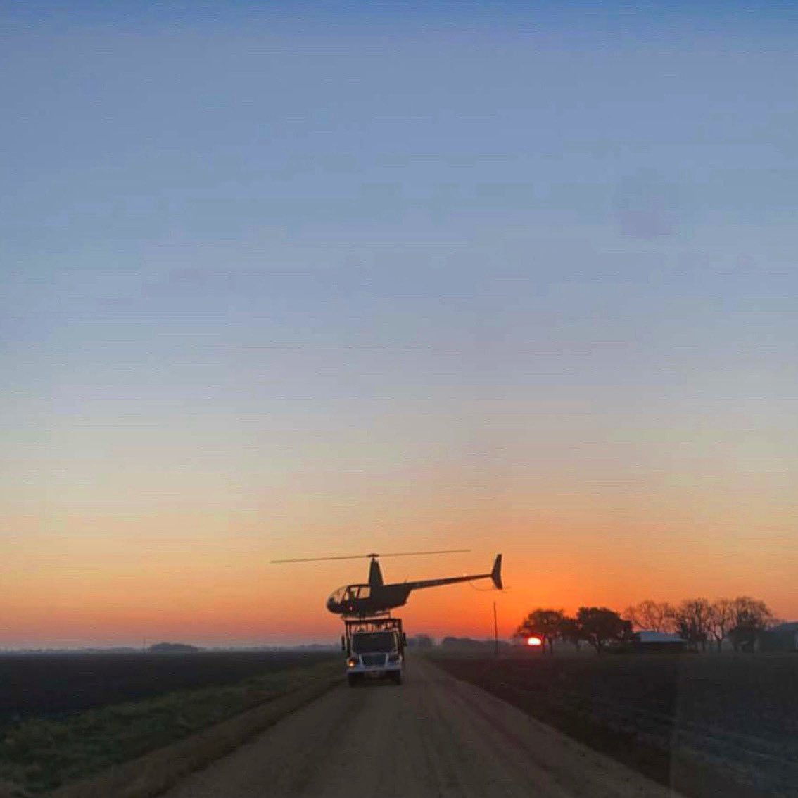 AceHelos's tweet photo. Just as dawn breaks and most are resting peacefully on a gorgeous Saturday morning, we prepare for another day of protecting our growers lands. 
#aviation #avgeek #robinsonhelicopters #robinsonr44 #agriculture #sunriseoftheday #ipullpitch #fly #pilotsofinstagram #texas #farm https://t.co/m7uEh5ZVxD