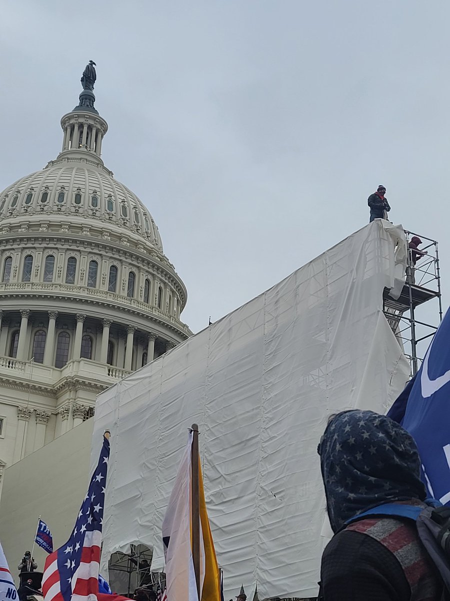 It was another surreal moment seeing folks climb the scaffolding with capitol dome in the back ground. I still can't process it all. Folks bring a giant American flag to drop from the top. 76/