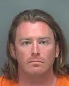 ARRESTED: Adam Christian Johnson, 36, is in Florida’s Pinellas county jail on a federal warrant. Charges include: theft of govt property, violent entry, disorderly conduct, and entering a restricted building.