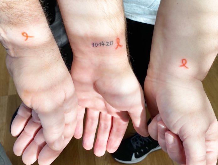 Seth_Anderson02's tweet photo. On 10/14/2020 my life changed forever when my mom was diagnosed with Chronic Myeloid Leukemia. Today, my mom, dad, and I all got matching tattoos because #NoOneFightsAlone #PamStrong🧡 https://t.co/xG40jh4etU