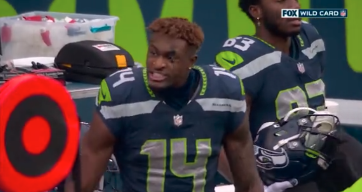 espn's tweet photo. DK Metcalf fired up on the sideline 😲

Playoff intensity 🔥 https://t.co/7bJTkFMNwy
