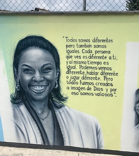 This is a mural in Medillin, Colombia quoting parts of God's Very Good Idea! 
I was sent this message, I'll share part:
 
 "The mural is on one of the most important streets of the city, and just about 5 blocks from where an infamous drug dealer grew up."

God is great!
 
(1/)