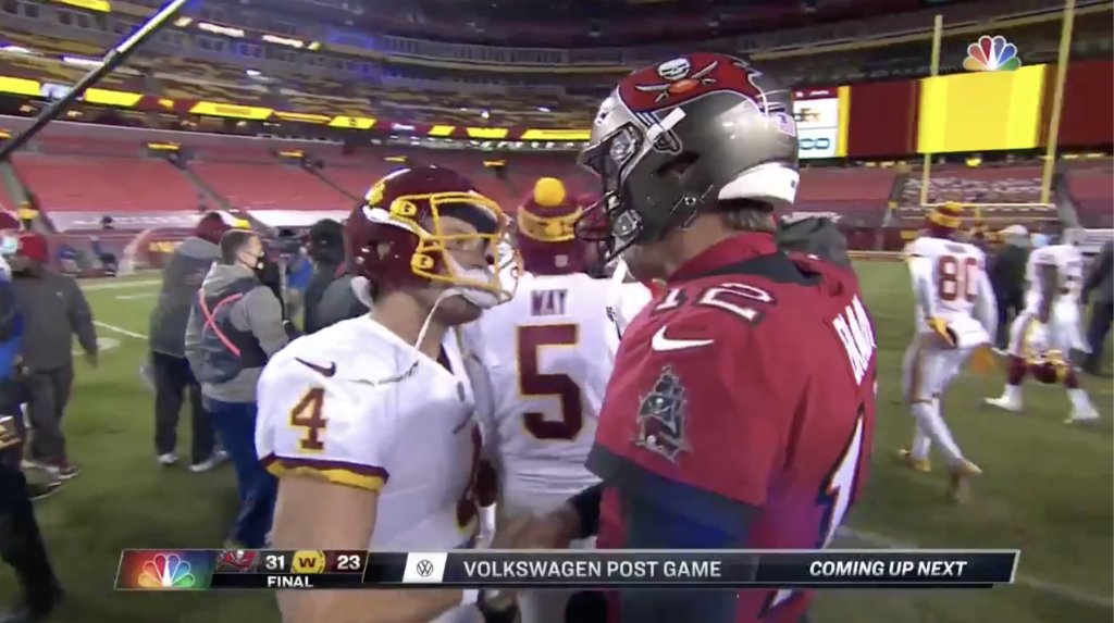 SportsCenter's tweet photo. Brady and Heinicke shake hands after combining for nearly 700 passing yards 🤝 @ESPNNFL https://t.co/rT1poe9Mp4