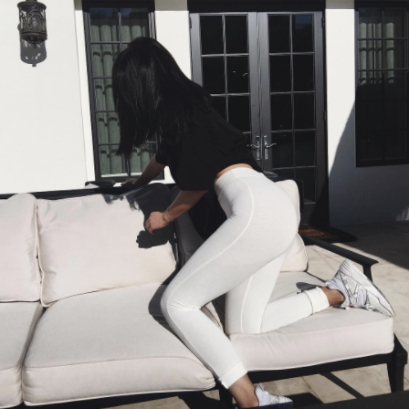 kylie jenner manages to knee the chair in its crotch but never succeeds in actually sitting :3