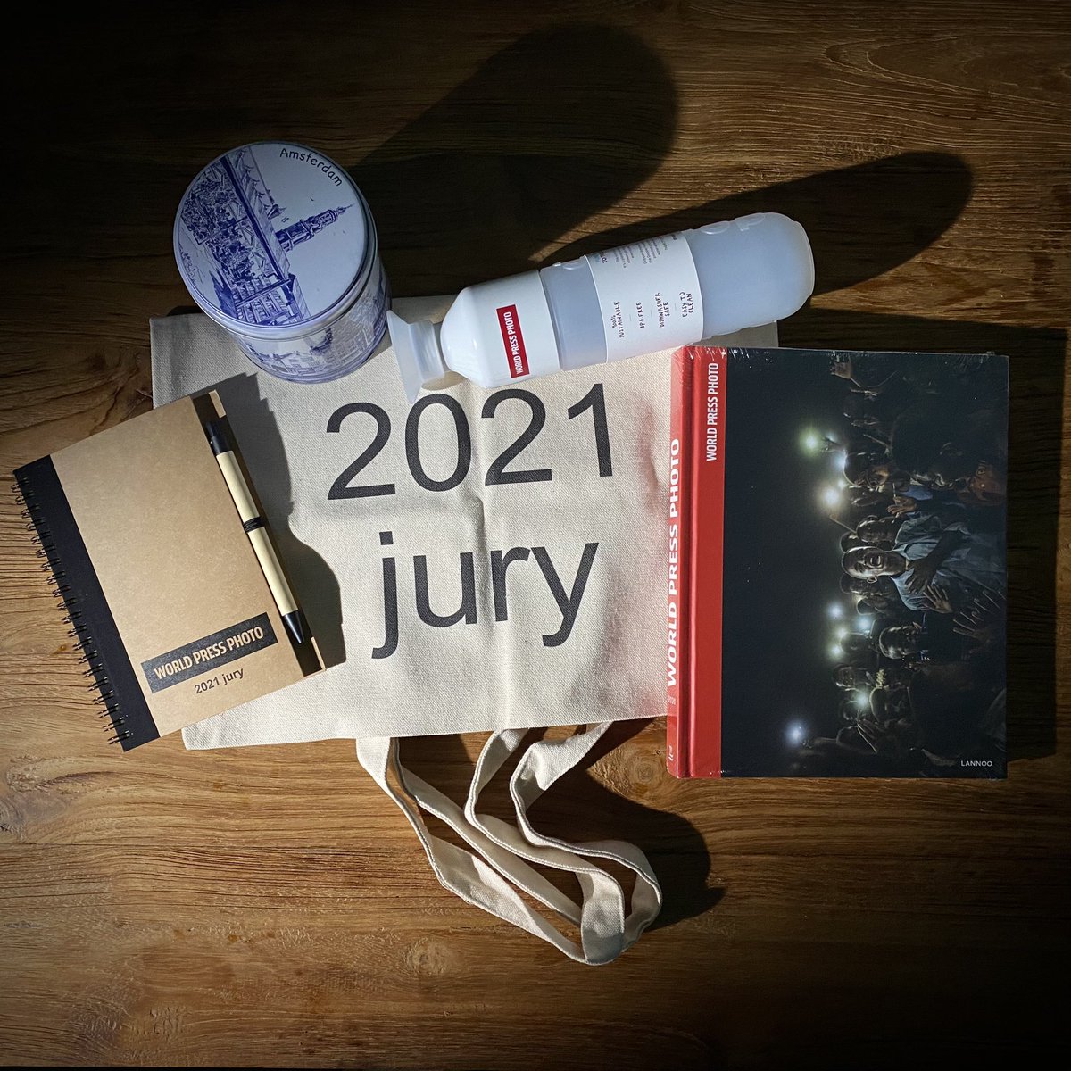 Rainy weather delivery... Thanks for the welcome pack <a href="/worldpressphoto/">World Press Photo</a>. The tin can labeled Amsterdam sure had me wondering what was inside. Btw, 2 days left to enter the 2021 WPP contest!