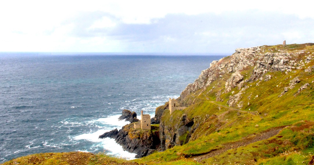 StEvalCandleCo's tweet photo. On the wild Tin Coast, the famed Crowns engine houses cling dramatically to the foot of the cliffs. Part of the Cornish Mining World Heritage Site and a popular #Poldark filming location, Botallack is owned and looked after by the National Trust. 🤍🌊
#lovecornwall #cornwallcoast https://t.co/yRkziIlkfW
