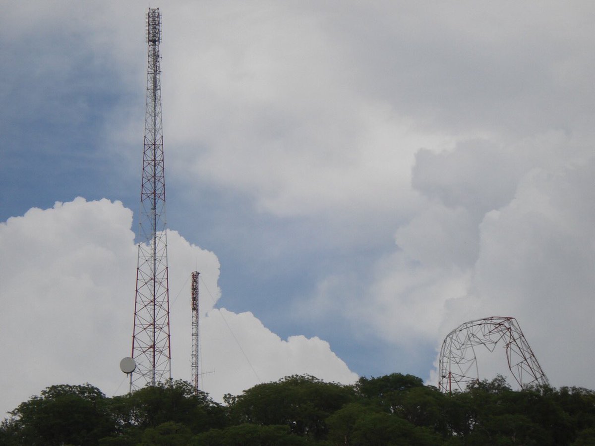 3. Picture below, from a neighbouring country, shows a telecomms tower that collapsed, obviously due to its structural design strength not being able to bear the load, under high speed winds! Loading is dependent on antennae sizes, no, weight, position on tower & wind speeds.