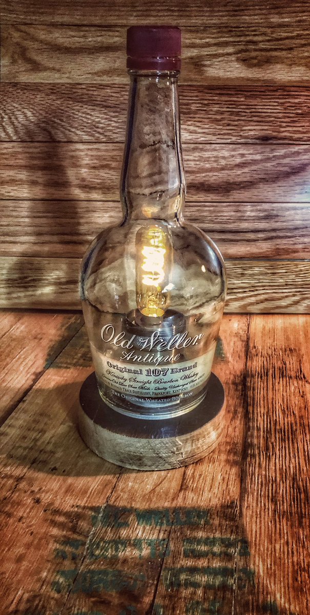 Ksp583's tweet photo. Here is the (old) Old Weller Antique 107 bottle. This is the classic bottle that they never should have stopped using. W/ LED bulb and barrel head base #wellerantique107 #weller #wellerbourbon #buffalotracedistillery #Buffalotrace #Kentucky #bourbonbarrel #etsy #bourbon #etsyshop https://t.co/oJCxApX1yj