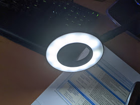 conpower's tweet photo. Picked up today in @Aldi_Ireland a handy #remotelearning tool - turns any phone into visualiser. Articulated phone clamp with USB powered LED. LED hue and brightness is adjustable and it clamps to a desk. #edchatie. Great for worked solutions etc. https://t.co/xsgmCgjYWc