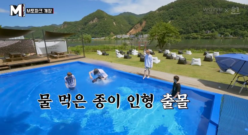 The one where Ten is watching Taeyong play in the pool