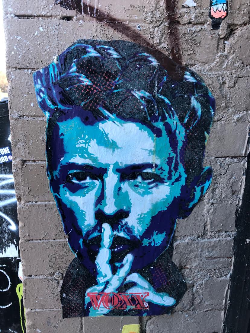 evgrieve's tweet photo. David Bowie died on this day in 2016. Here's a look at some of the tribute art that went up around the East Village/NYC in the days that followed... https://t.co/vnITXkYQ4T