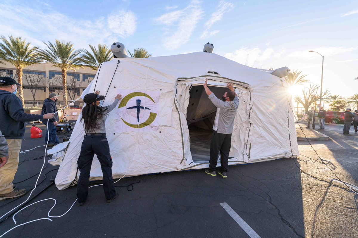 Franklin_Graham's tweet photo. Boxes are unloaded and the tents are going up for a @SamaritansPurse Emergency Field Hospital to help treat the heavy Covid-19 caseload in California. https://t.co/VybA6a2wJu