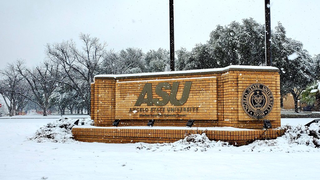 Snow on the ASU brick sign.