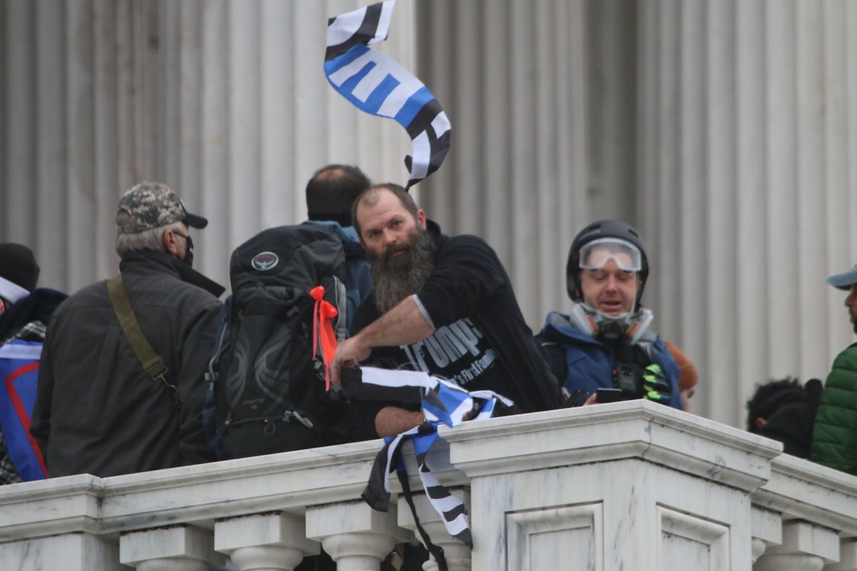 And the crowd reviled them for it. They booed the police and FBI swat team, calling them traitors and murderers. A man on the back Capitol steps ripped up a Thin Blue Line flag, the torn stripes fluttering down over a crowd briefly chanting “fuck the police.” 15/22