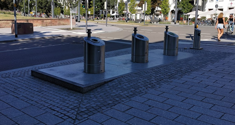 1) Large unsightly & environmentally damaging asphaltturning areas are needed in almost every small side road 2) Underutilised dead spaces which could be used forhomes are left on edges of developmentsA solution? Either extend the distance or permit communal bins