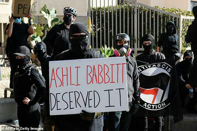 #Antifa had an event at Pacific Beach in San Diego yesterday. One of them held a sign saying Capitol Hill protester Ashli Babbitt deserved to die.
