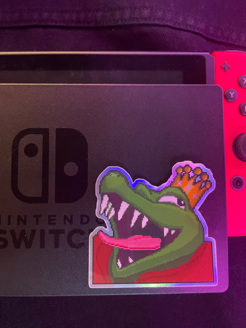 Sweensi's tweet photo. Restocked my etsy shop with more stickers. I've also made a new smaller size for the star fox stickers that fit on gamecube controllers. go check it out! https://t.co/YZUf7WpNIB https://t.co/4TCo0agqcn