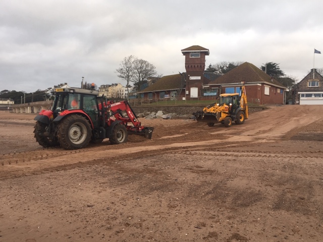 eastdevon's tweet photo. #EDDCStreetSceneOps are working hard on removing sand from the road and pavements along #Exmouth Seafront including Beach Gardens and #QueensDrive. Our teams are also working on our #beachpullback to reduce the height of the sand at the sea wall. https://t.co/OPocXRV0Xs