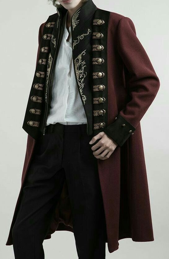 Philza: couldnt find more clearer picture but that is inside and the coat draped on his shoulder.