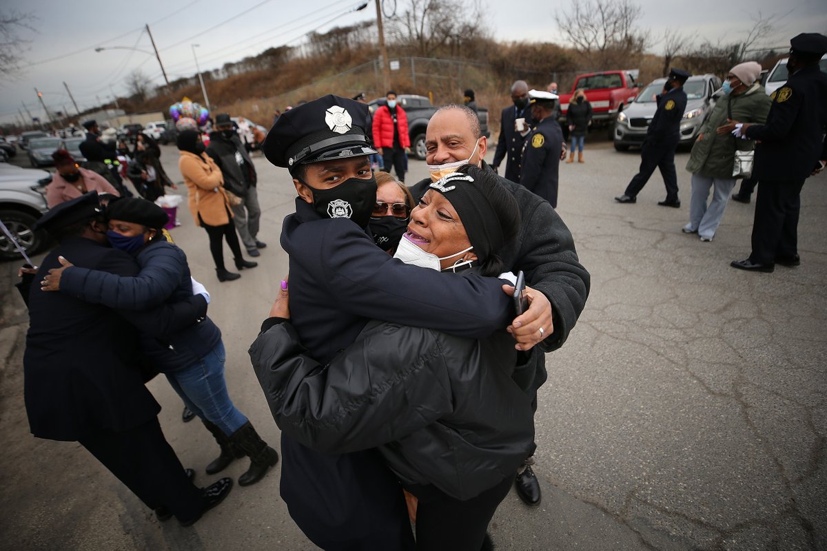 The 94 members of Class 198 from the Philadelphia Fire Academy graduate in a closed ceremony due to COVID-19. Some family members waited outside the gates to greet the graduates after the ceremony.