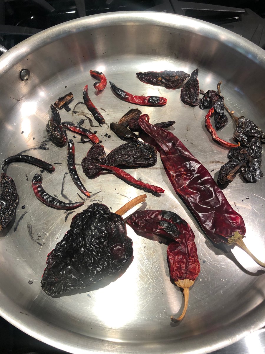 Using a mix of guajillo, ancho, chipotle, pasilla, and chiles de arbol. Heat each side of each pepper for 45 second.