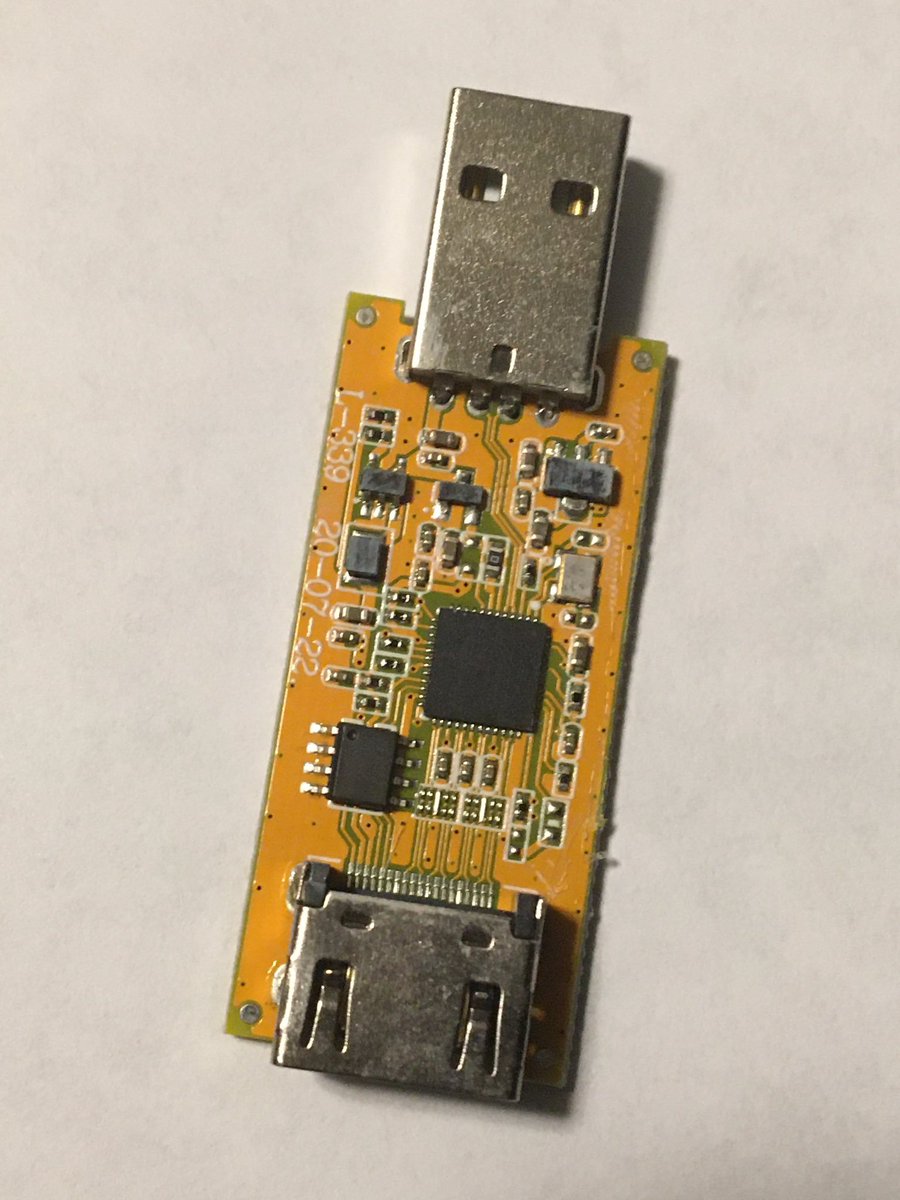 Hooboy, this one gets interesting.... component size dropped to 0402 mostly, and there's SUPERGLUE outgassing residue ALL over it. Waiting for chip ID numbers, no heatsinking makes me concerned.